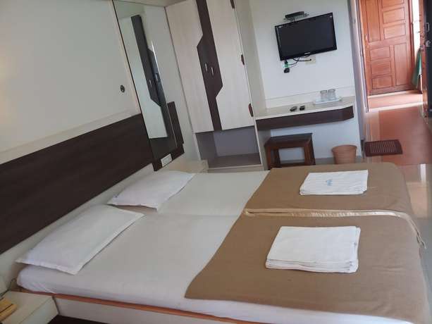 Imagen de la habitación del Hotel Priyadarshini Classic. Foto 12