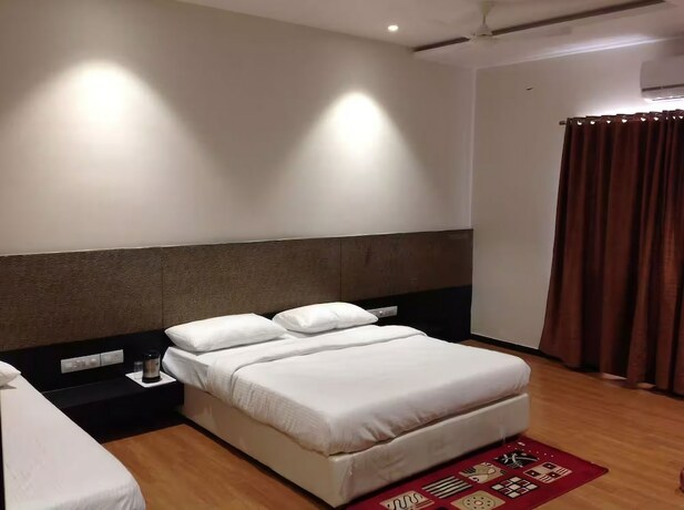 Imagen de la habitación del Hotel Priyanjali and Garden. Foto 9