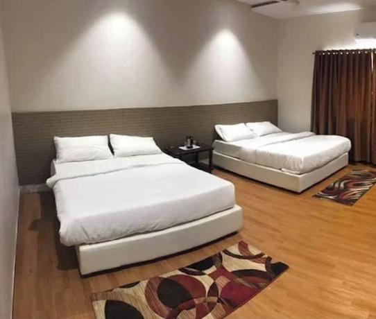 Imagen de la habitación del Hotel Priyanjali and Garden. Foto 10