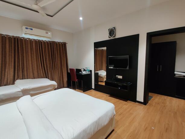 Imagen de la habitación del Hotel Priyanjali and Garden. Foto 11