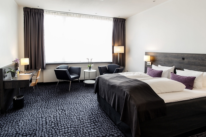 Imagen de la habitación del Hotel ProfilHotels Mercur. Foto 5