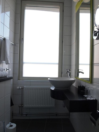 Imagen de la habitación del Hotel Profilhotels Central. Foto 10