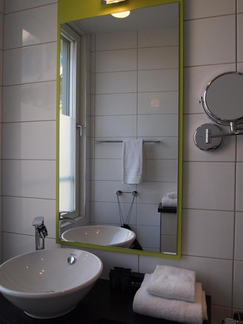 Imagen de la habitación del Hotel Profilhotels Central. Foto 11