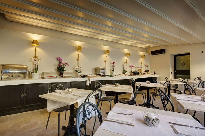 Imagen del bar/restaurante del Hotel Profumo Maison Colosseo. Foto 3