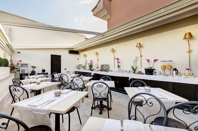 Imagen del bar/restaurante del Hotel Profumo Maison Colosseo. Foto 4