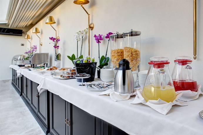 Imagen del bar/restaurante del Hotel Profumo Maison Colosseo. Foto 5