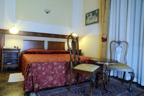 Imagen de la habitación del Hotel Progresso. Foto 9