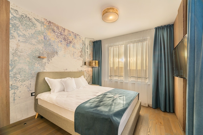 Imagen de la habitación del Hotel Promenada Studios. Foto 9