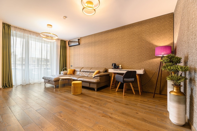 Imagen de la habitación del Hotel Promenada Studios. Foto 13