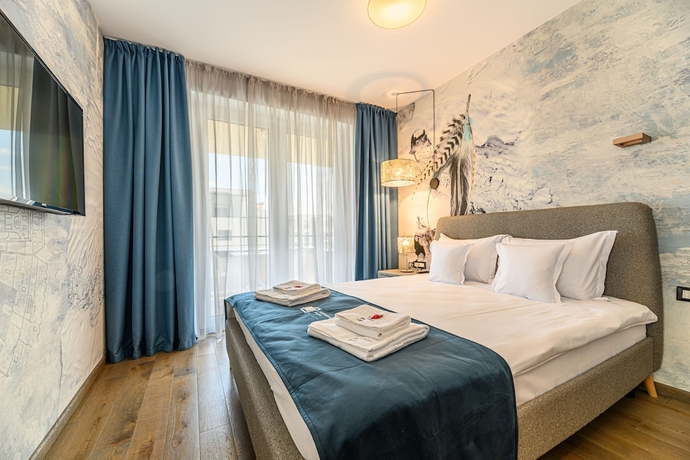 Imagen de la habitación del Hotel Promenada Studios. Foto 14