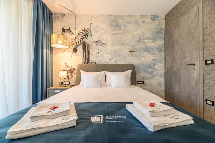 Imagen de la habitación del Hotel Promenada Studios. Foto 15