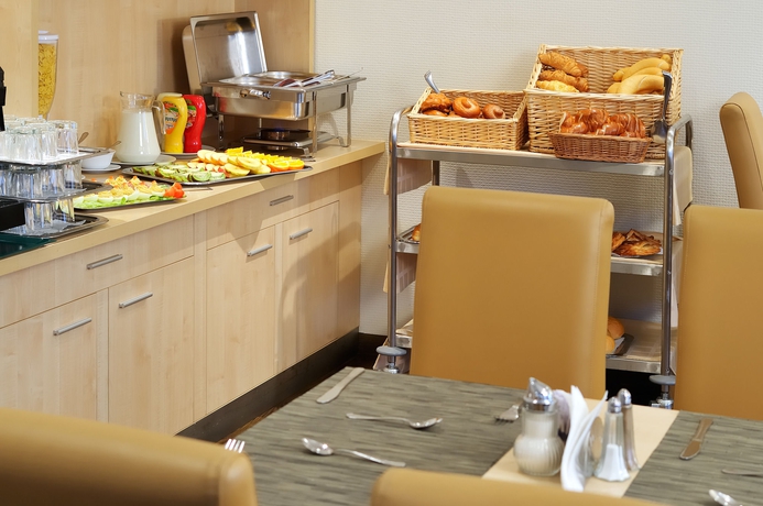 Imagen del bar/restaurante del Hotel Promenade City. Foto 7