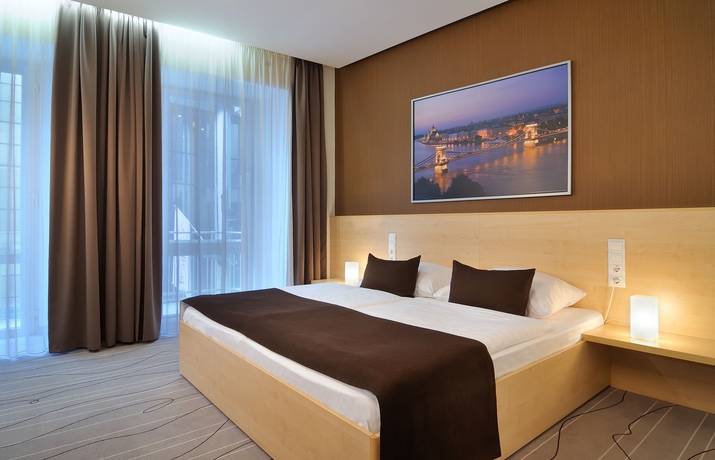 Imagen de la habitación del Hotel Promenade City. Foto 11