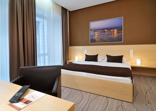 Imagen de la habitación del Hotel Promenade City. Foto 15