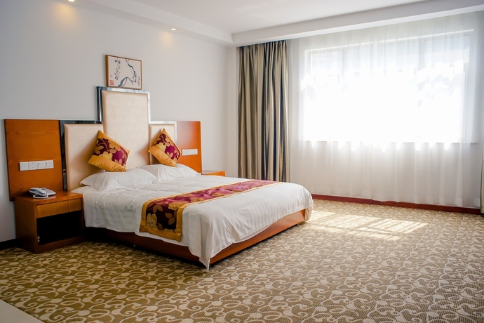 Imagen de la habitación del Hotel Promise Home. Foto 6