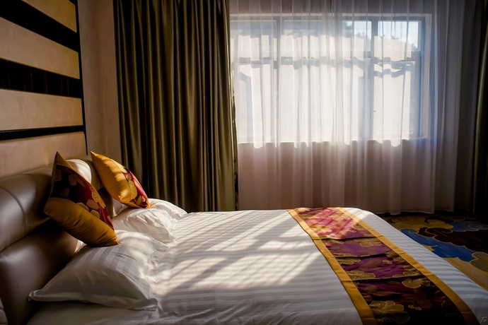 Imagen de la habitación del Hotel Promise Home. Foto 12