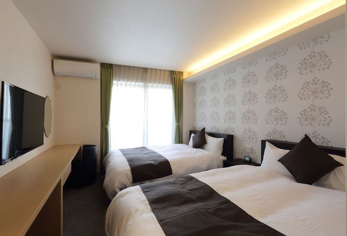 Imagen de la habitación del Hotel Promote Hiroshima. Foto 5