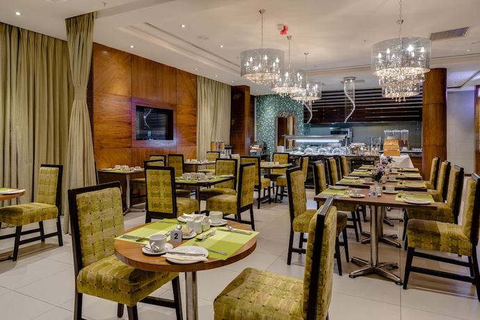 Imagen del bar/restaurante del Hotel Protea By Marriott Benin City Select Emotan. Foto 2