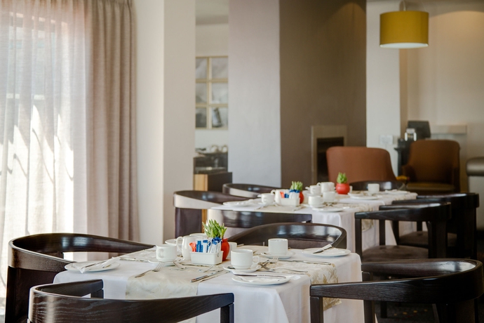 Imagen del bar/restaurante del Hotel Protea By Marriott Cape Town Tyger Valley. Foto 3