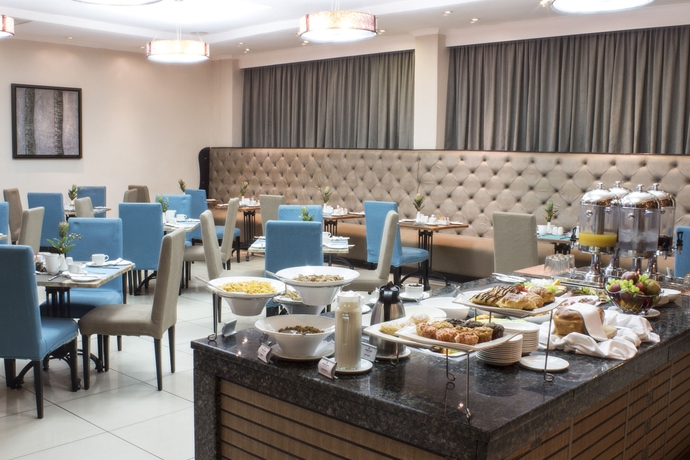 Imagen del bar/restaurante del Hotel Protea By Marriott Lusaka. Foto 3