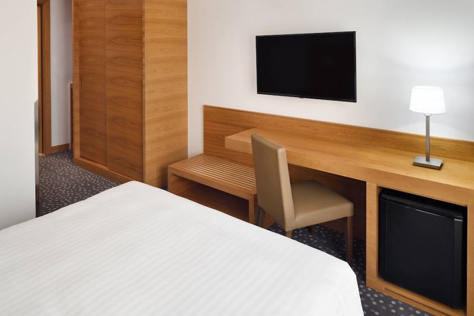 Imagen de la habitación del Hotel Protea Constantine. Foto 8