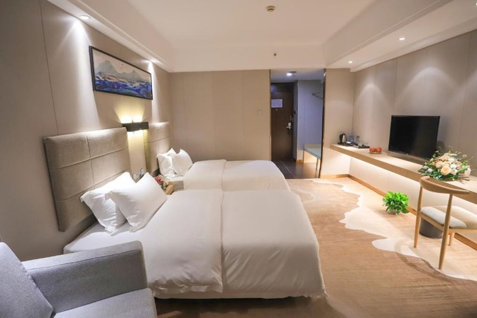 Imagen de la habitación del Hotel Proud Way Shenzhen. Foto 15