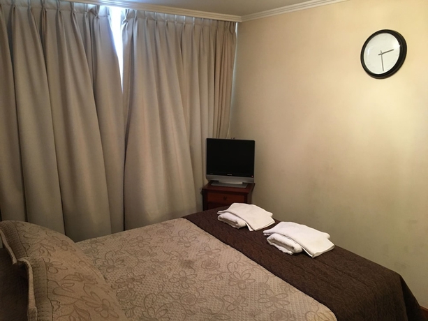 Imagen de la habitación del Hotel Providencia Suite Padre Mariano. Foto 10