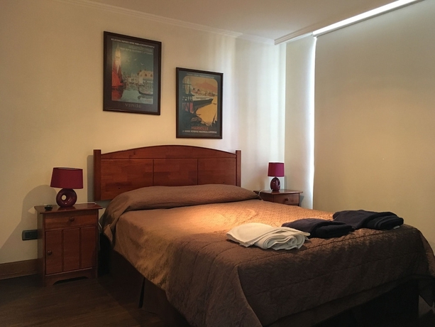 Imagen de la habitación del Hotel Providencia Suite Padre Mariano. Foto 11