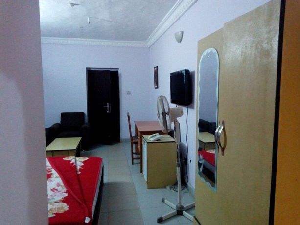 Imagen de la habitación del Hotel Prowess and Suites. Foto 3