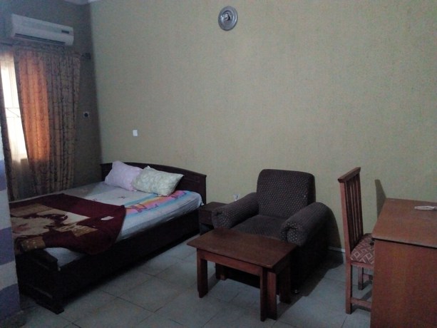 Imagen de la habitación del Hotel Prowess and Suites. Foto 7