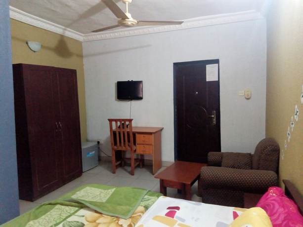 Imagen de la habitación del Hotel Prowess and Suites. Foto 8