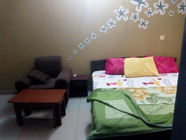 Imagen de la habitación del Hotel Prowess and Suites. Foto 9