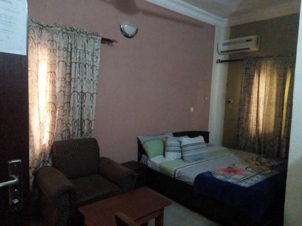 Imagen de la habitación del Hotel Prowess and Suites. Foto 10