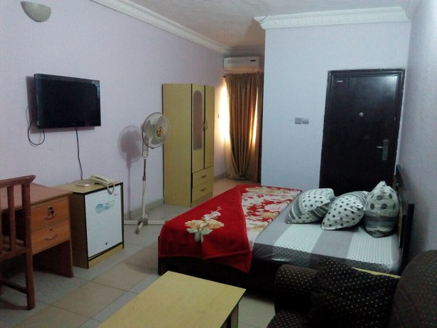 Imagen de la habitación del Hotel Prowess and Suites. Foto 11