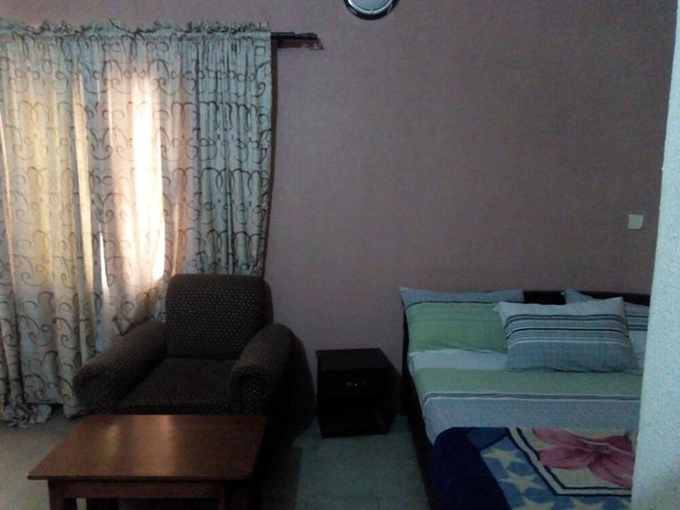 Imagen de la habitación del Hotel Prowess and Suites. Foto 12