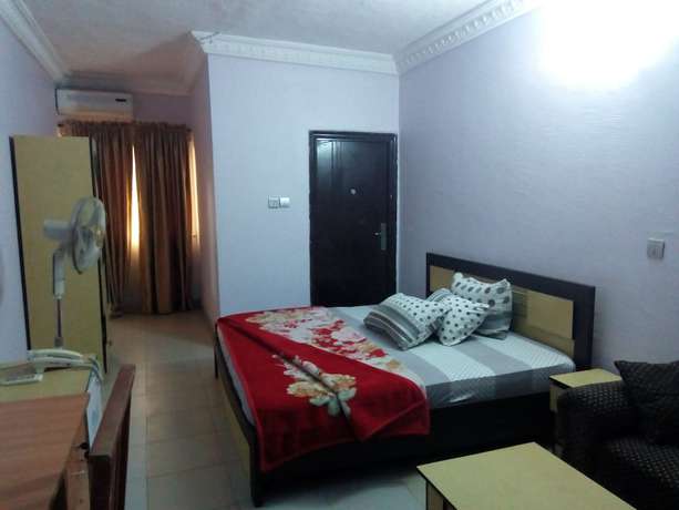 Imagen de la habitación del Hotel Prowess and Suites. Foto 15