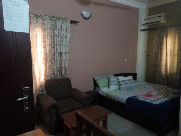 Imagen de la habitación del Hotel Prowess and Suites. Foto 17