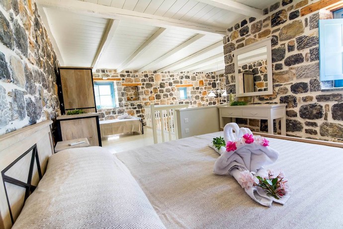 Imagen de la habitación del Hotel Pserimos Villas. Foto 2