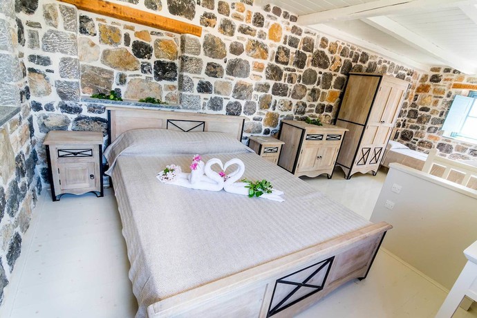 Imagen de la habitación del Hotel Pserimos Villas. Foto 6