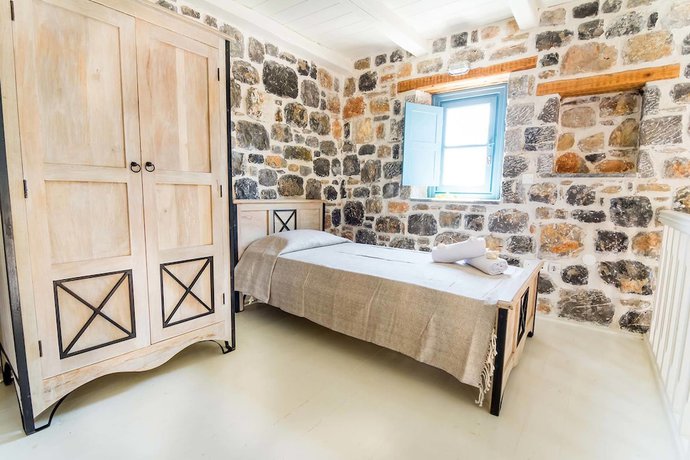 Imagen de la habitación del Hotel Pserimos Villas. Foto 7