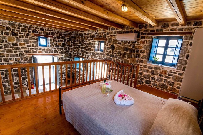 Imagen de la habitación del Hotel Pserimos Villas. Foto 9