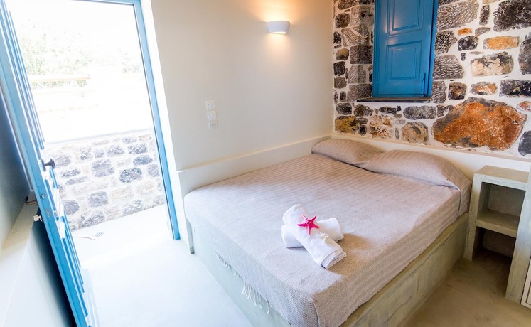 Imagen de la habitación del Hotel Pserimos Villas. Foto 11