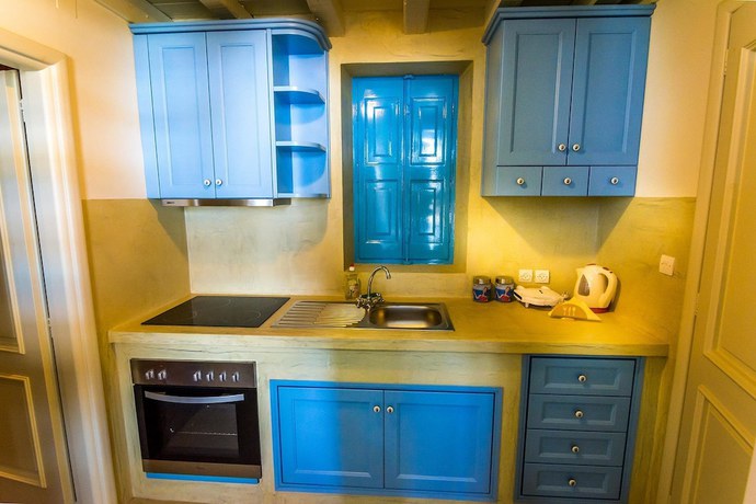 Imagen de la habitación del Hotel Pserimos Villas. Foto 14