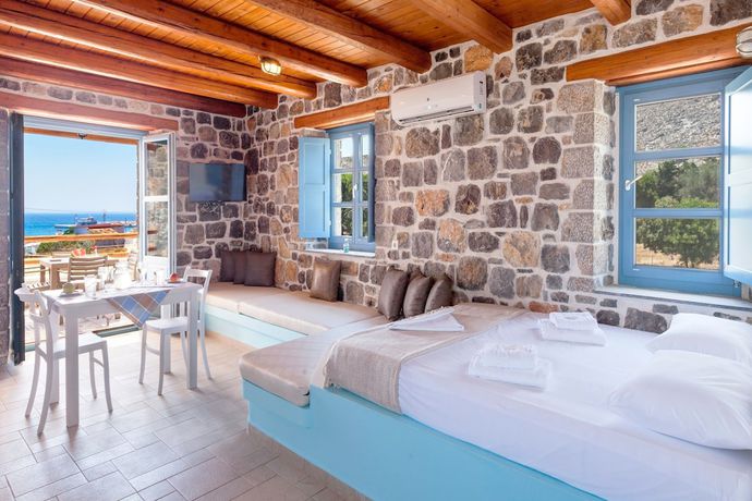 Imagen de la habitación del Hotel Pserimos Villas. Foto 17