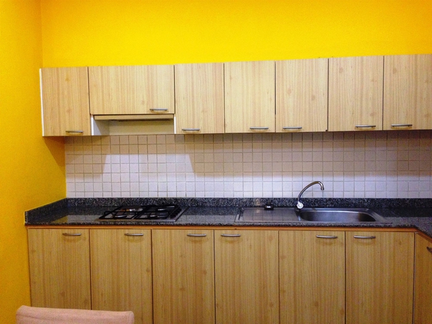 Imagen de la habitación del Hotel Pt Court. Foto 5