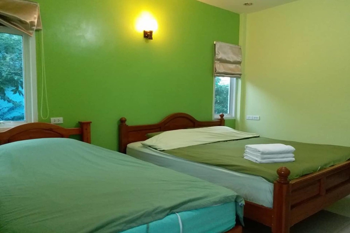 Imagen de la habitación del Hotel Pt House Resort. Foto 4