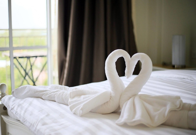 Imagen de la habitación del Hotel Pua De View Boutique Resort. Foto 11