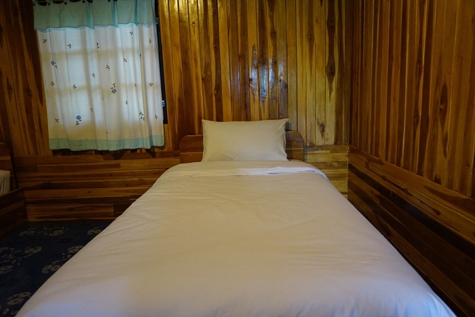 Imagen de la habitación del Hotel Pua Happy Resort. Foto 3