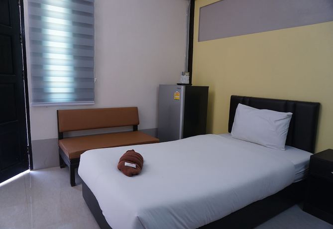 Imagen de la habitación del Hotel Puangpech. Foto 7