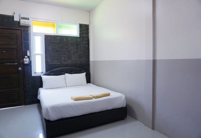 Imagen de la habitación del Hotel Puangpech. Foto 8